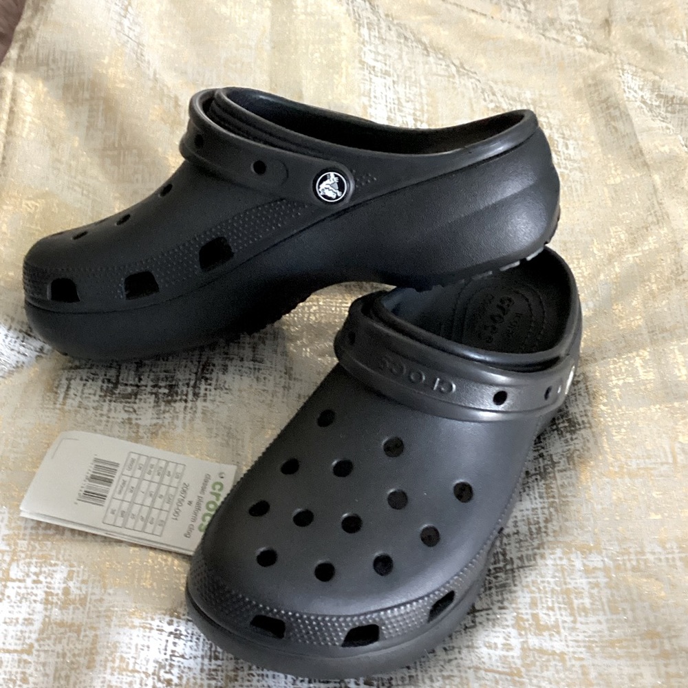 Crocs brand, black classic platform crocs.